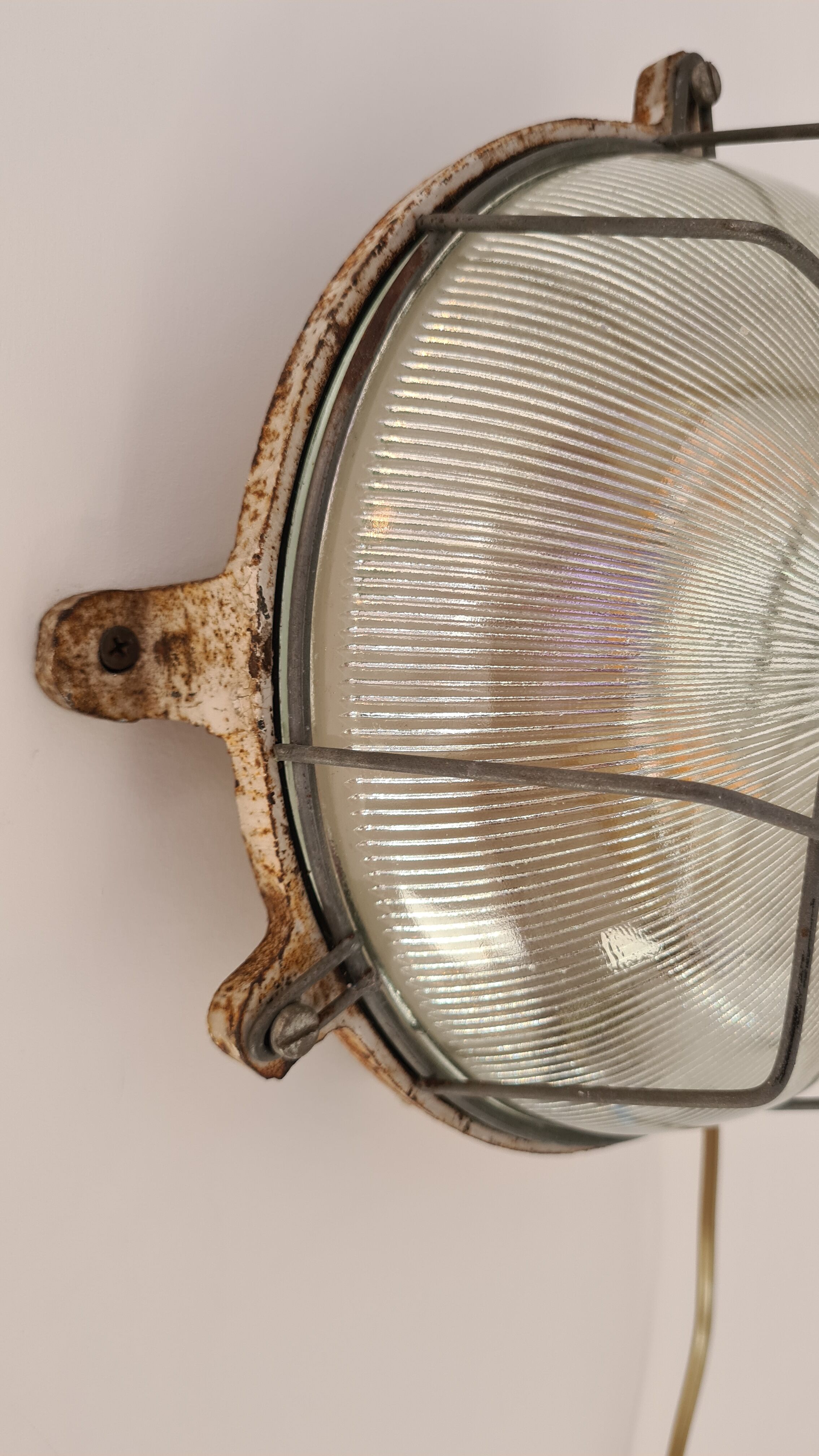 Cast iron porthole wall lamp by TH