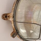 Cast iron porthole wall lamp by TH