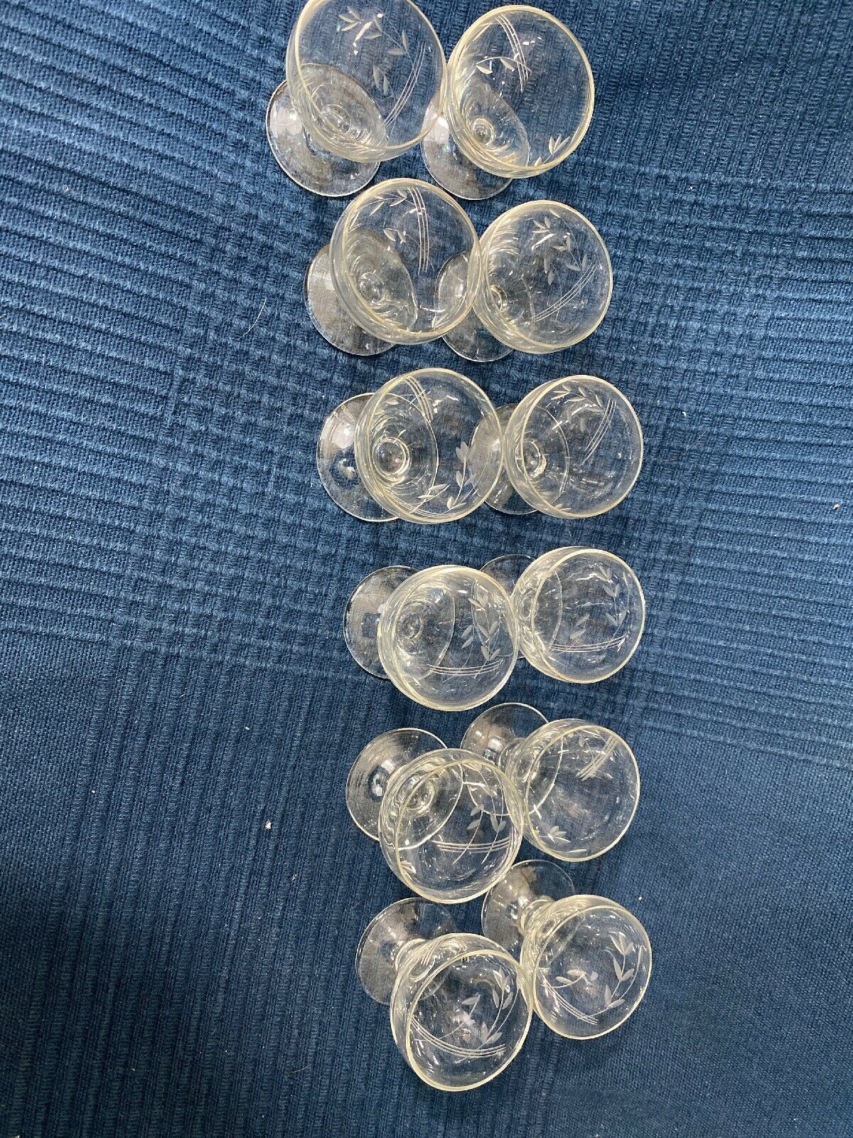 Set of 12 hand-sized crystal glasses with flower decoration
