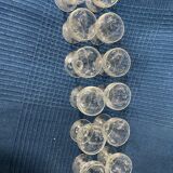 Set of 12 hand-sized crystal glasses with flower decoration