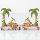 Pair of Art Deco Bookends in Pink Breccia Marble with Antelope and Palm Tree