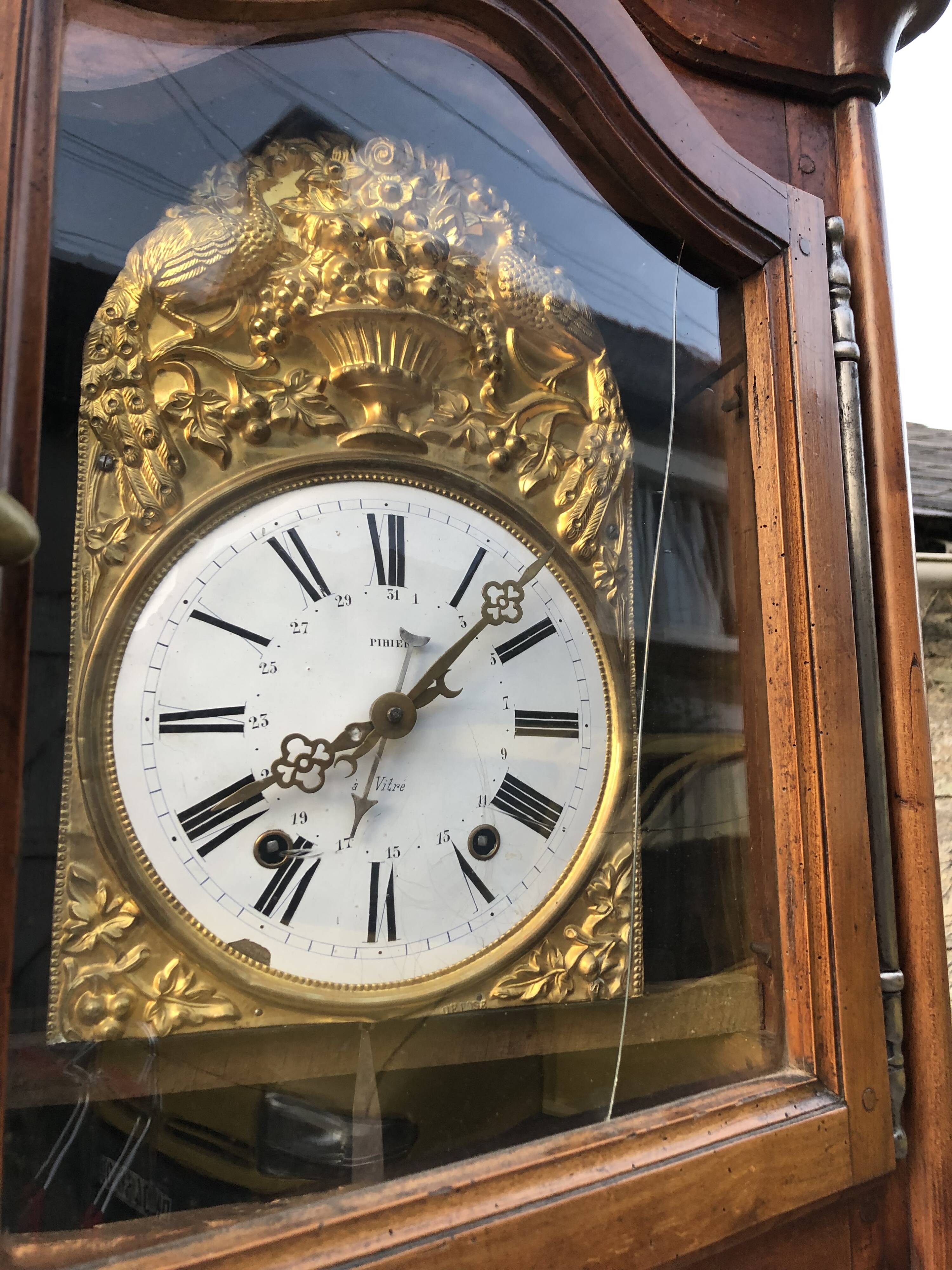 Comtoise clock in cherry style Louis XV period 19th region Fougères.