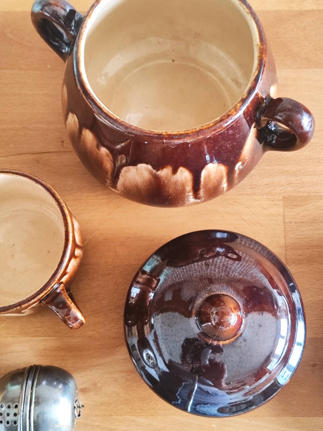 Vintage coffee service in glazed brown ceramic.