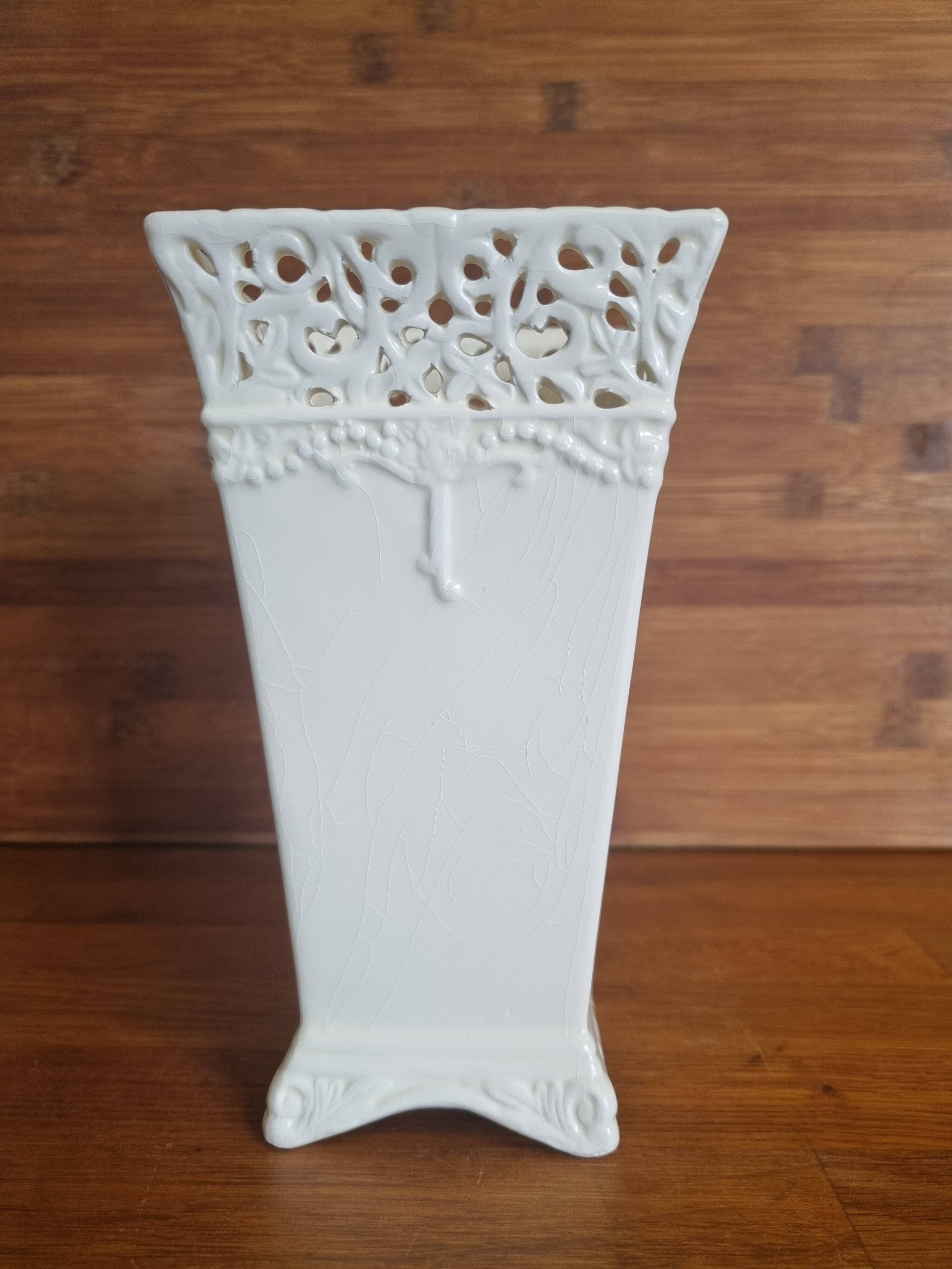 Vintage ceramic vase with lace edge