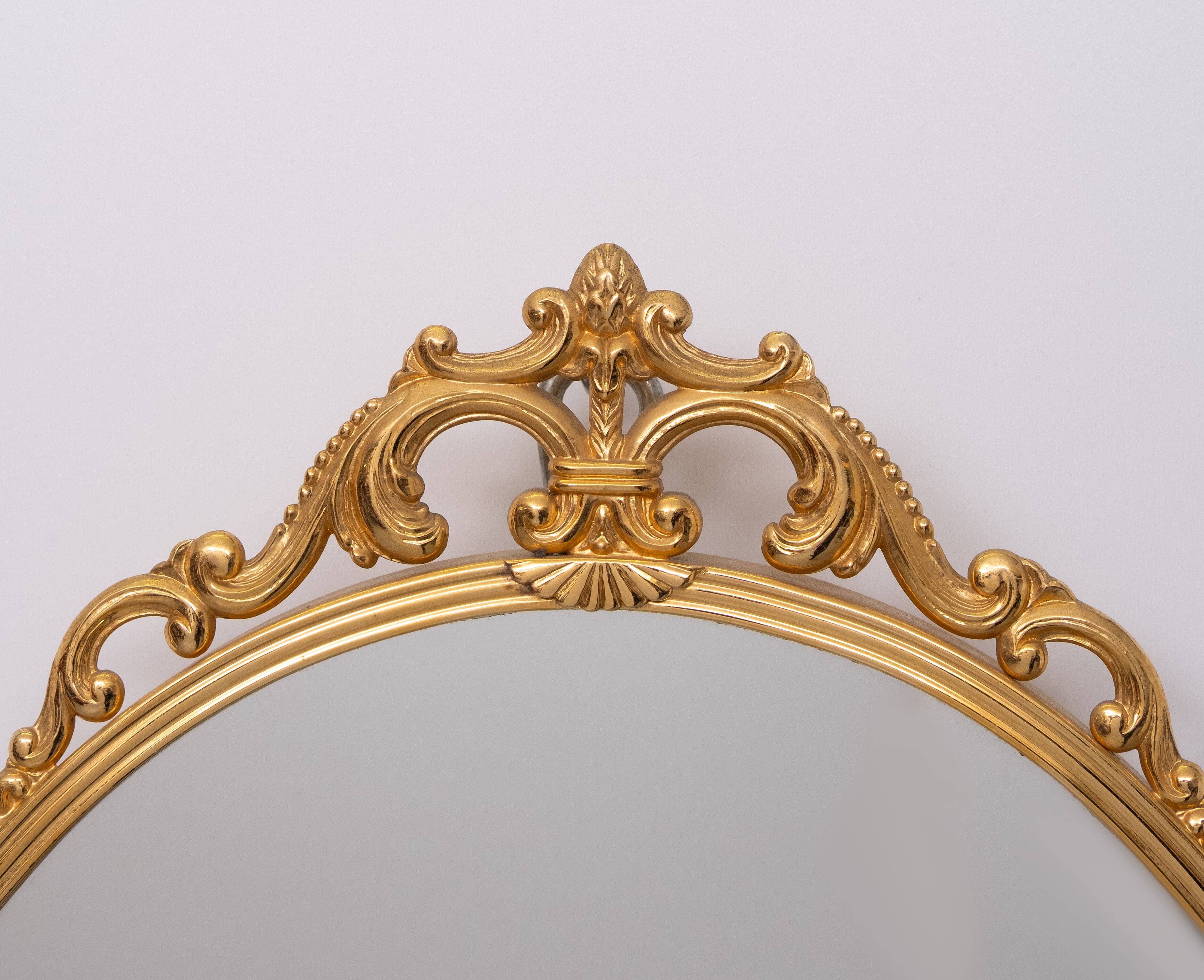 set of 4 Brass Classic medallion shaped wall Mirrors 1970s