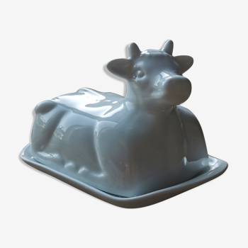 White ceramic butter maker in the shape of a cow