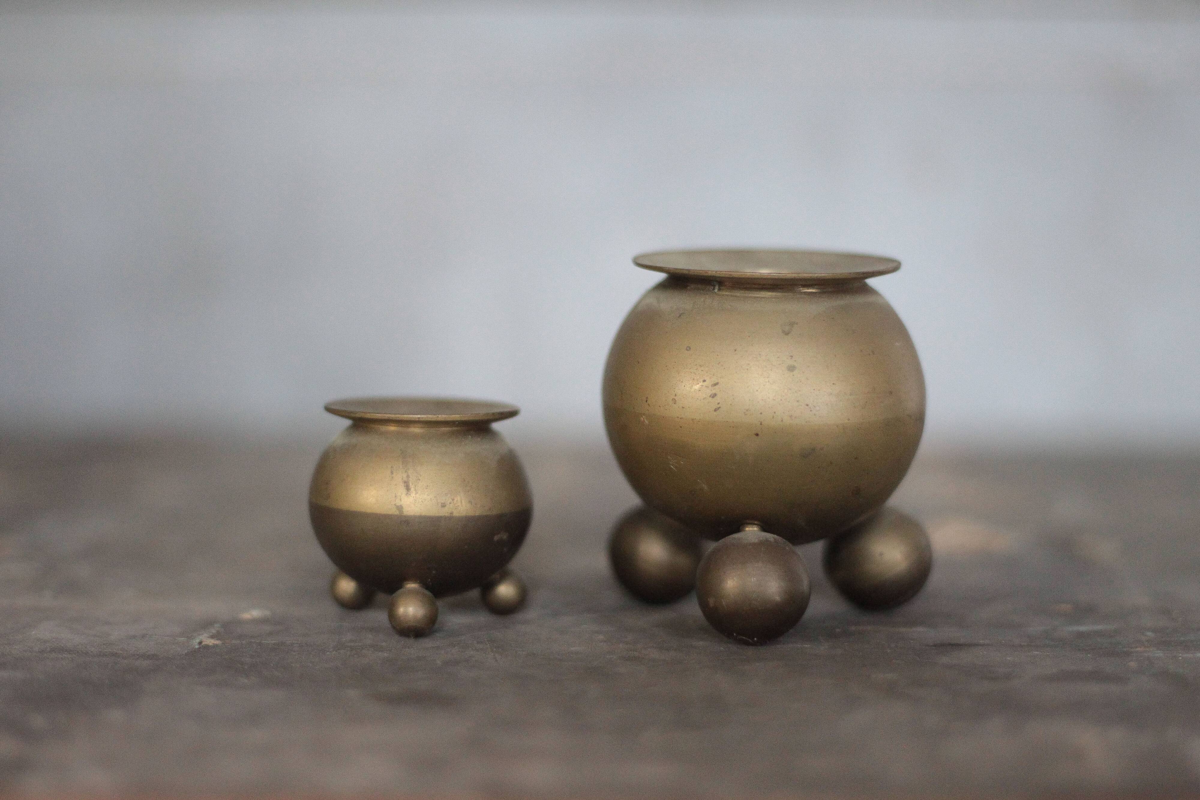 Pair of brass tripod candle holders, Gusum Bruck Sweden, candle holder.