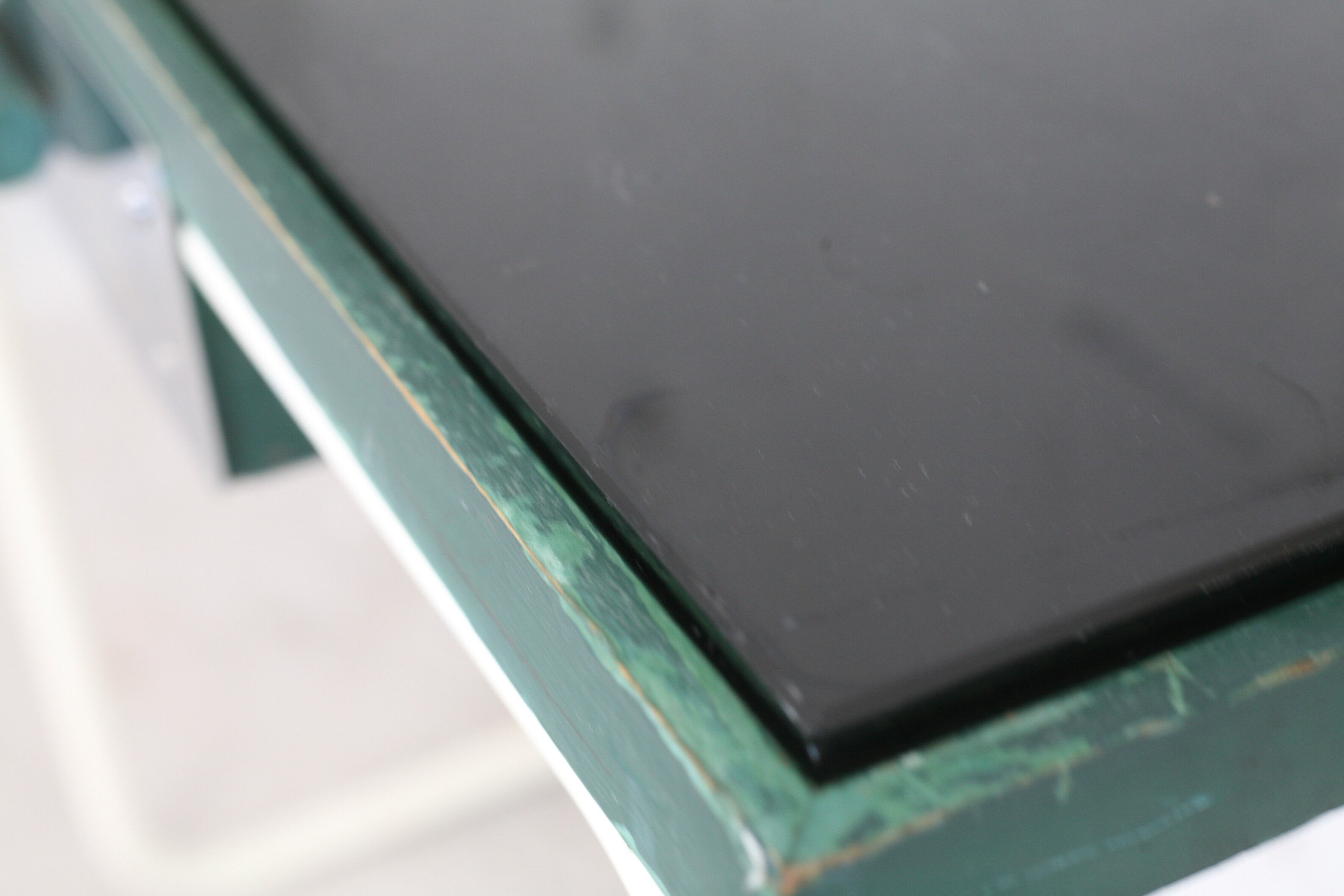 Tubular steel console, black glass tray, circa 1950