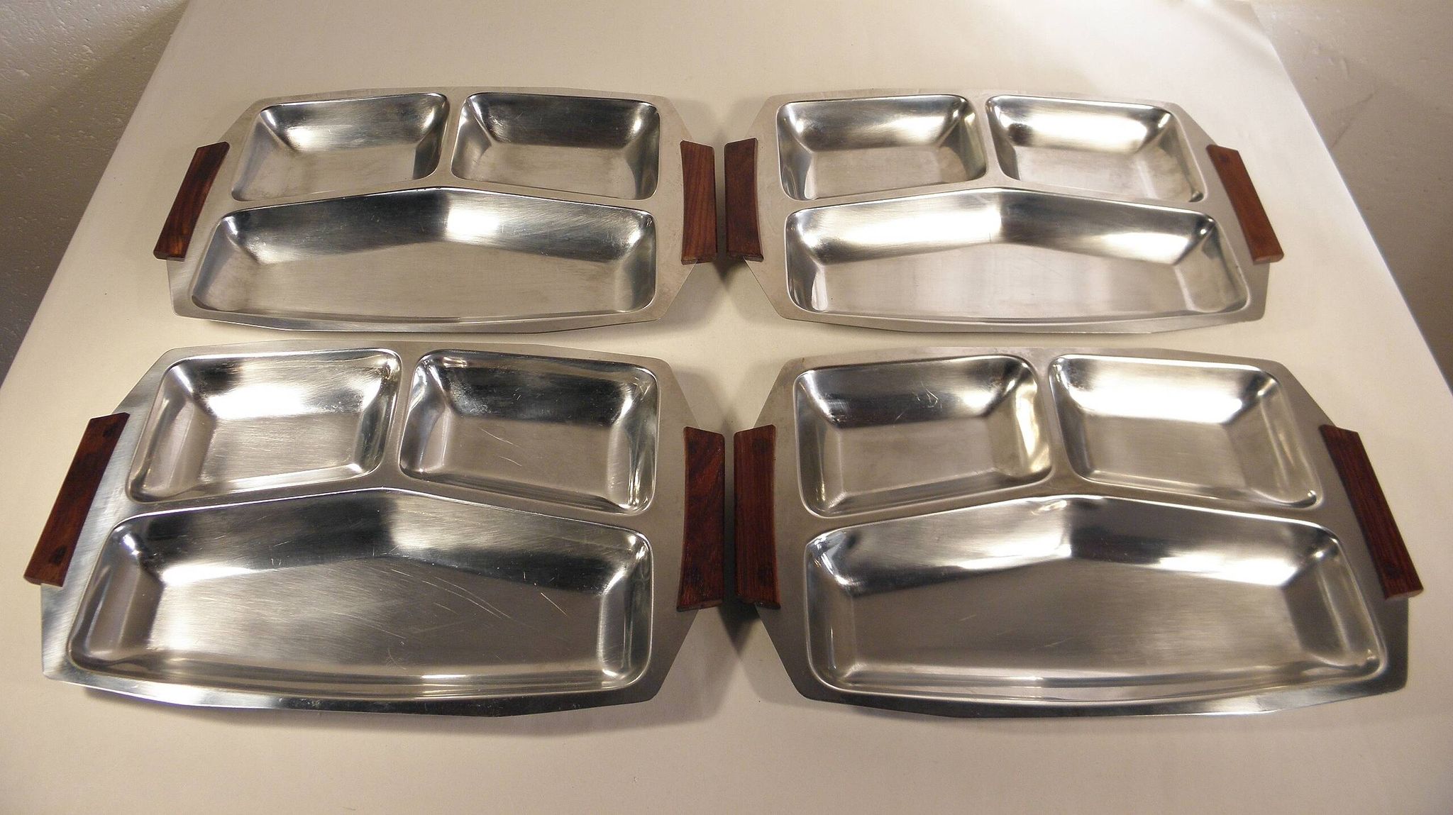 Set of 4 stainless steel and wood trays from the 70s