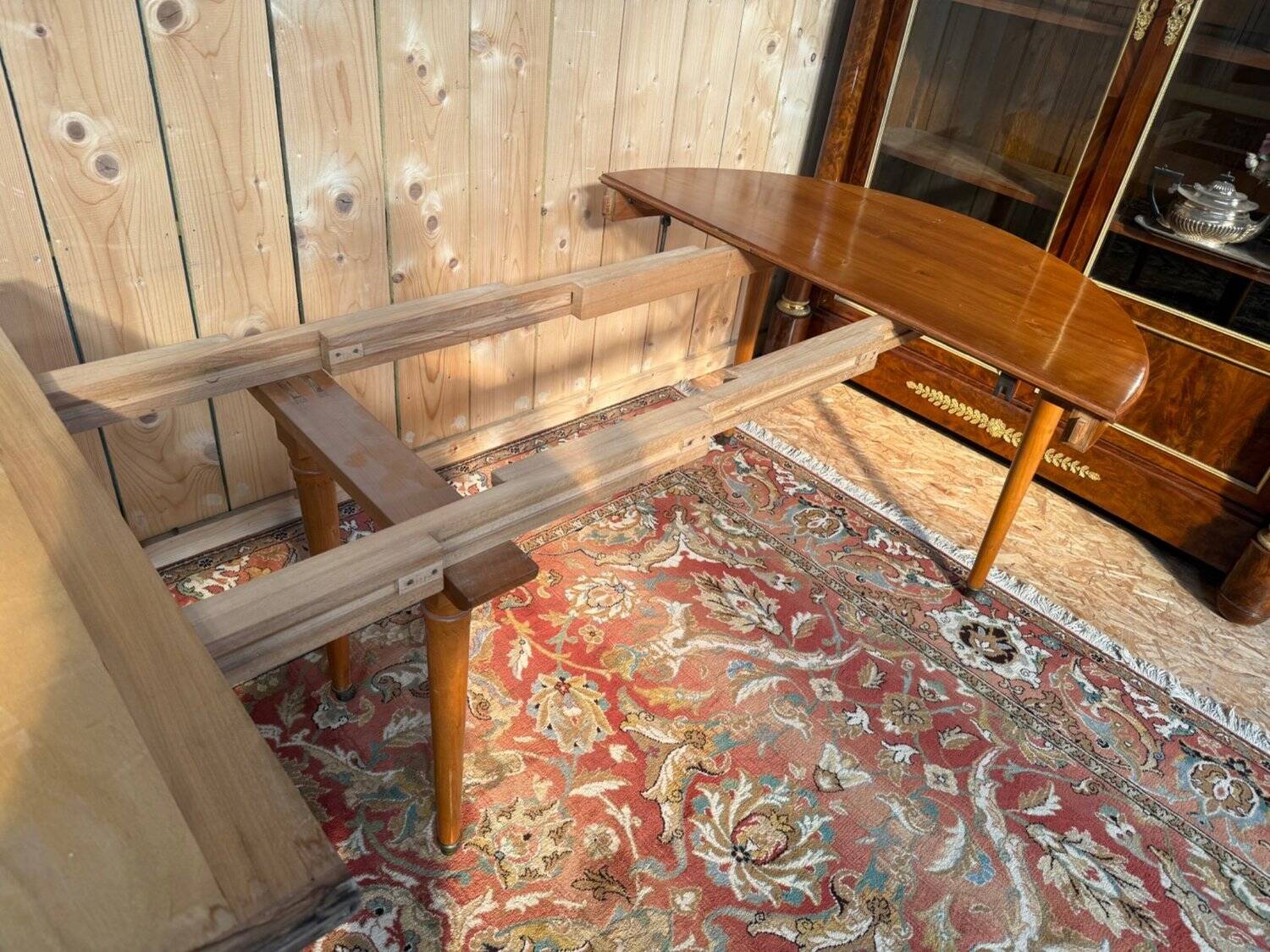 Louis XVI style dining table in cherry wood with extension.