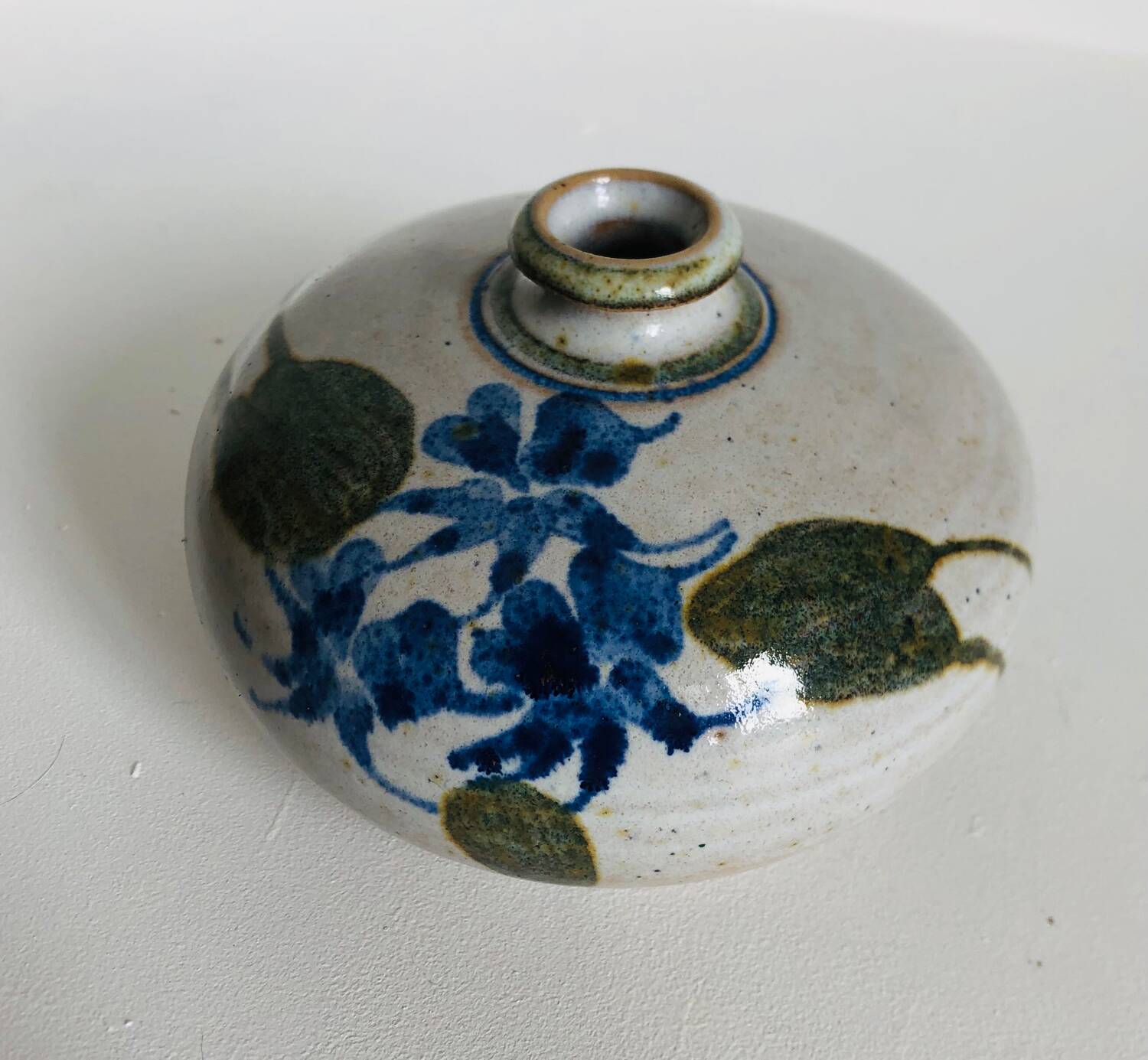 Ceramic bud vase with floral decoration