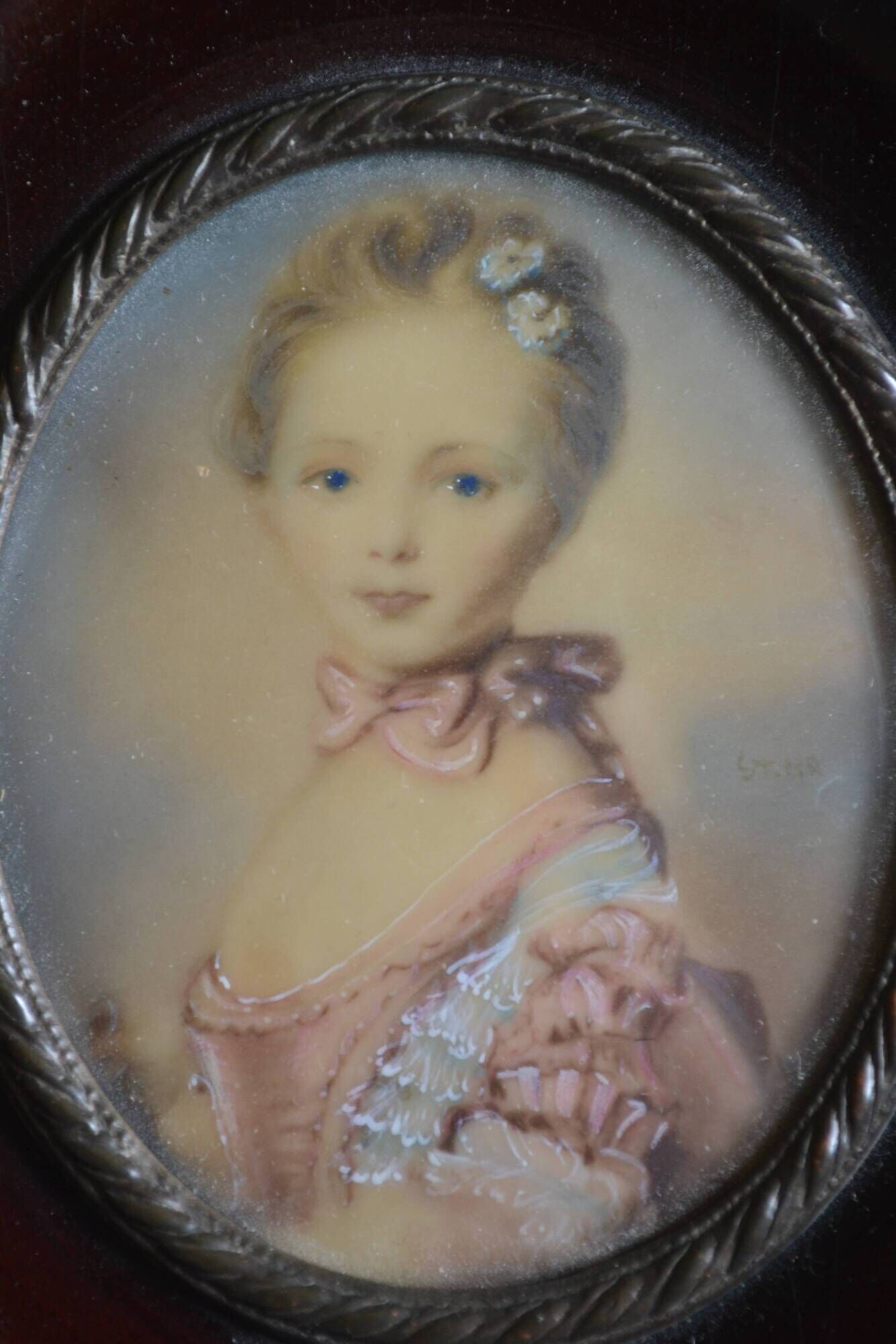 Miniature portrait of a young girl, framed and under glass