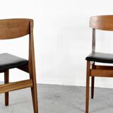 Ensemble de 4 chaises en teck et similicuir du milieu du siècle.