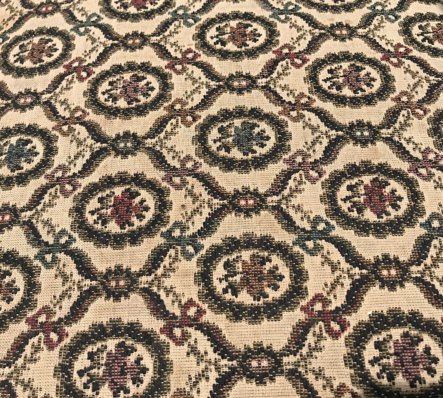 Antique chair seat upholsterer medallions