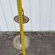 Antique brass chandelier with 3 lights and frosted glass shades.