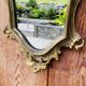 Magnificent antique baroque mirror in gilded bronze.