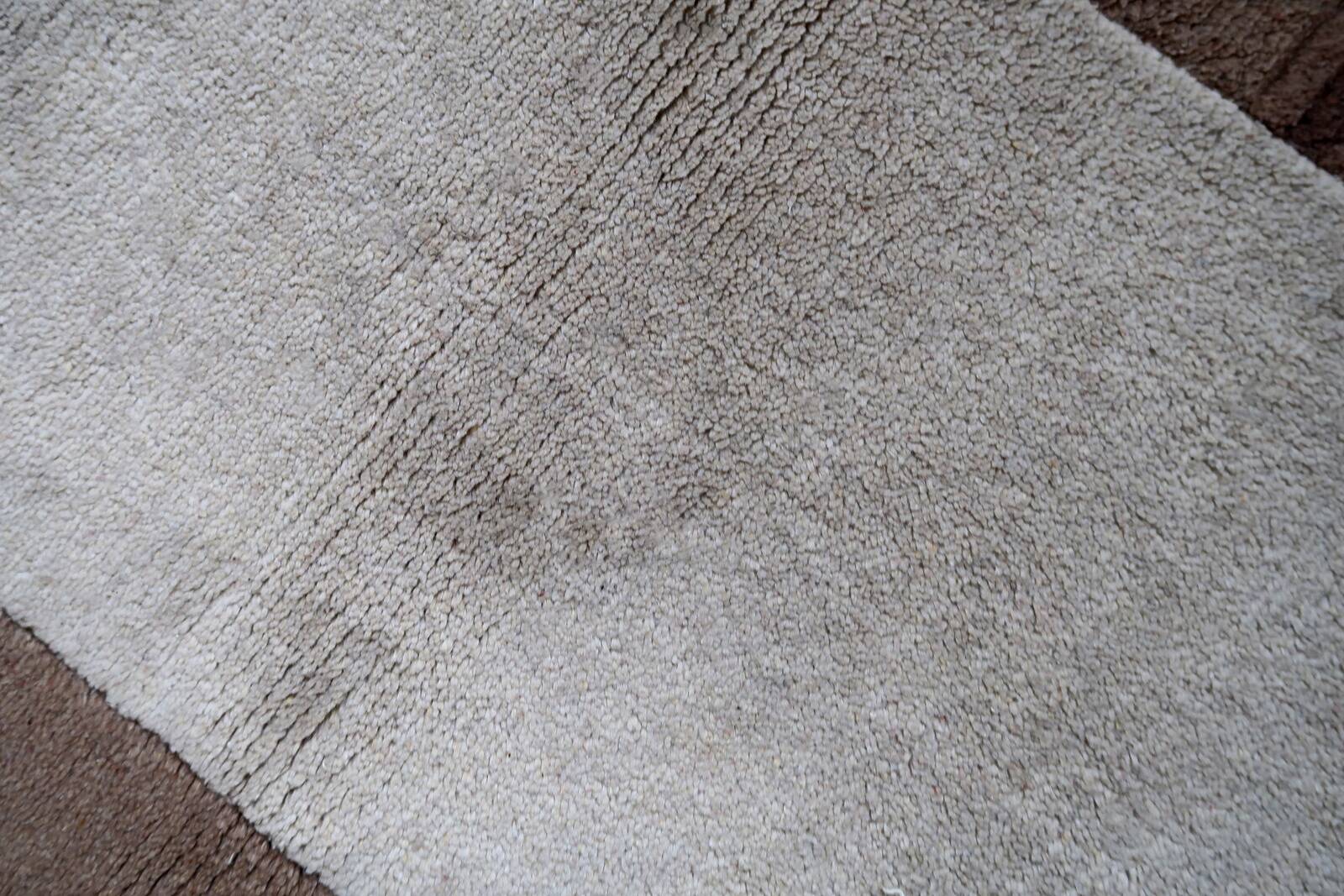 Tapis vintage tibétain Khaden fait main en laine – 64 x 124 cm  Années 1970