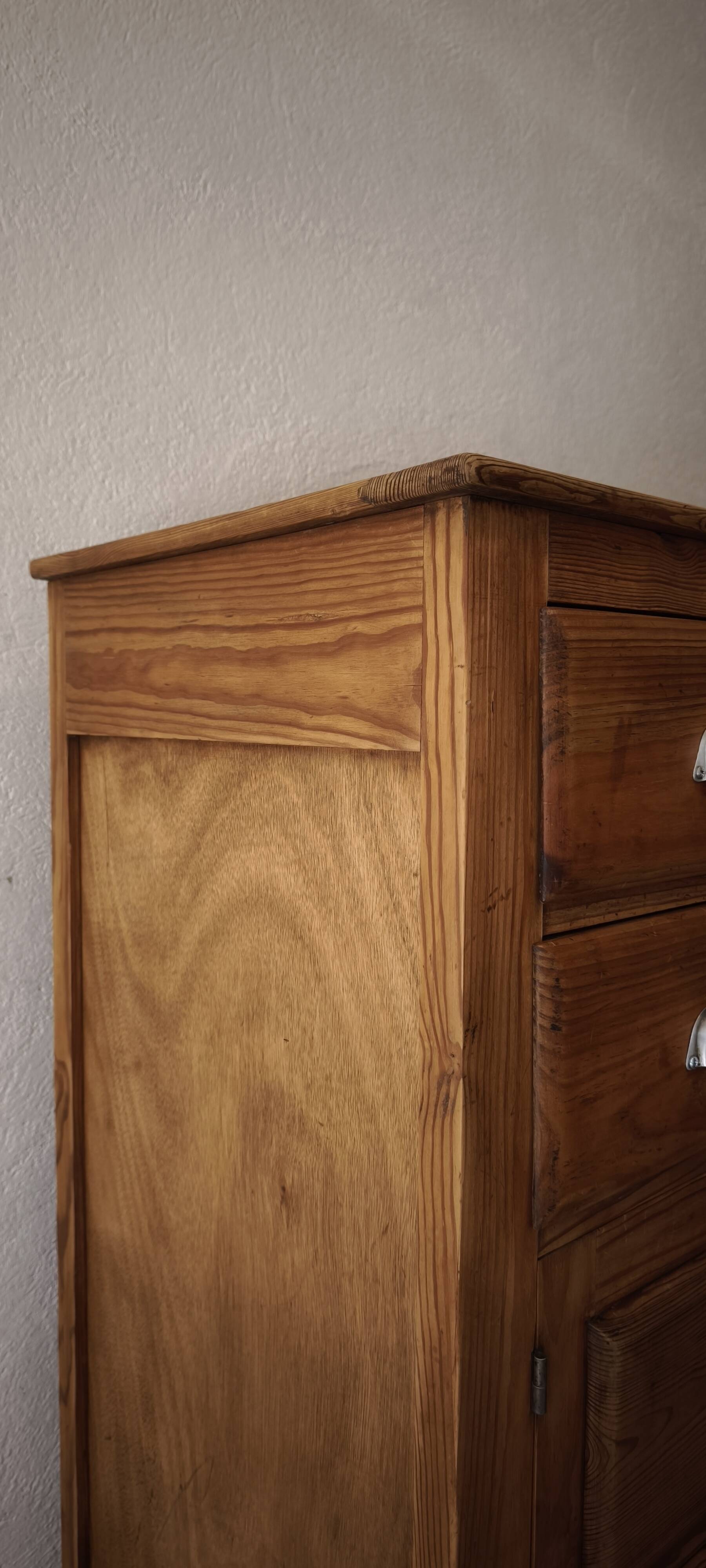 Small antique workshop furniture made of solid wood.