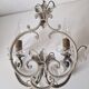 Pair of sconces in patinated metal and crystal tassels
