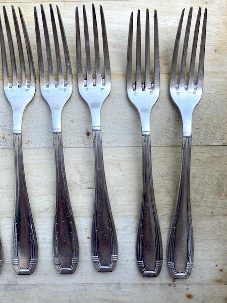 11 silver metal forks