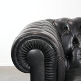 Black chesterfield 3-seater sofa made of cowhide leather in English style