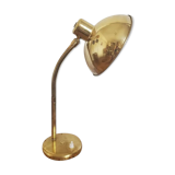 Golden hinged desk lamp