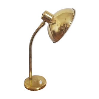 Golden hinged desk lamp