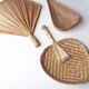 Trio of wall decorations in straw and wicker, 70s