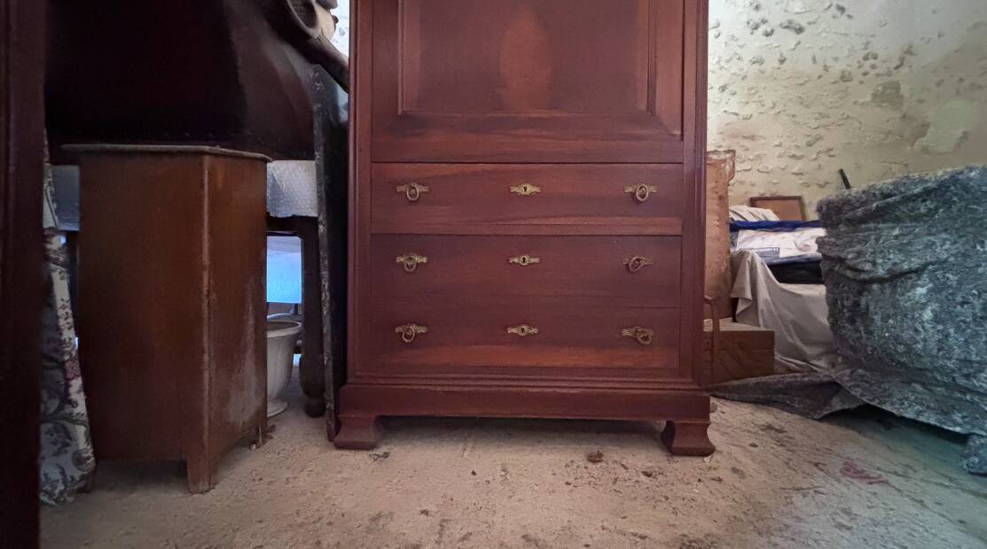 Secretary desk with mahogany and flame veneer.