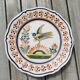 Decorative plate in earthenware, bird decoration, Henriot de Quimper. Bréhat Island.
