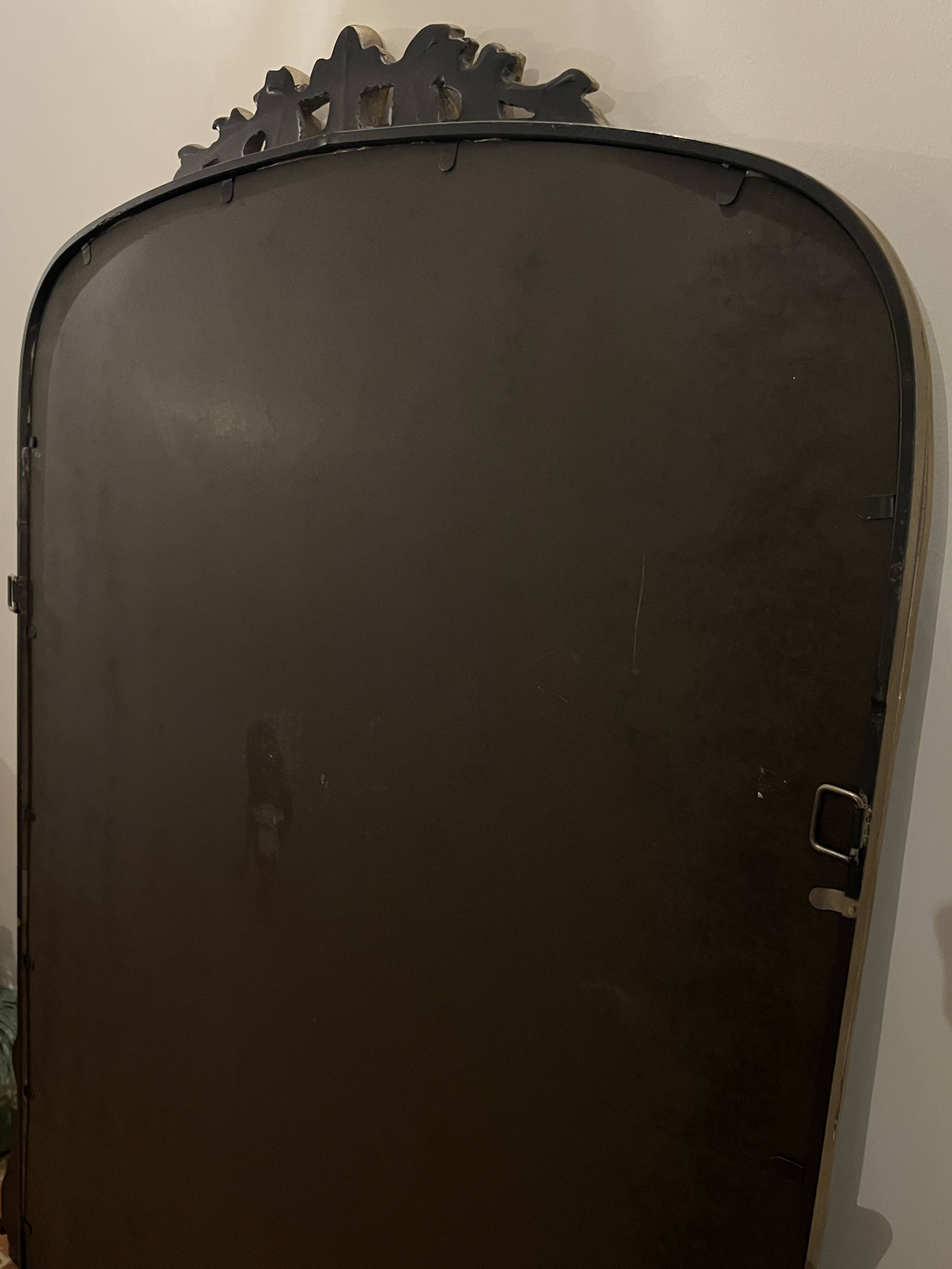 Large gilded mirror with pediment