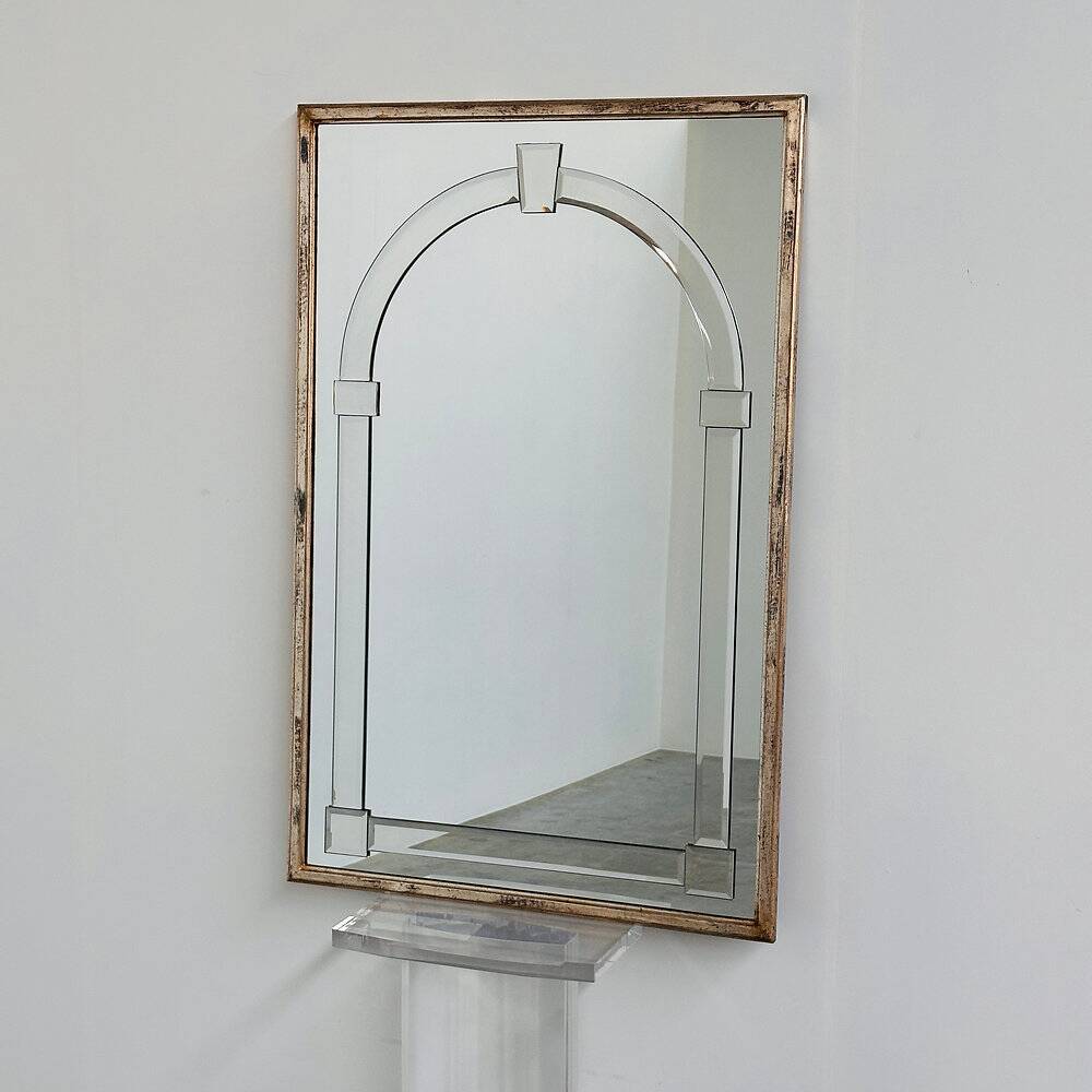 Large Art Deco style beveled wall mirror with architectural arch design