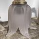 Flower wall lamp in glass and gold metal