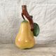 Vintage ceramic bottle in the shape of a pear.