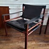Set of 2 armchairs and their Sirocco Safari Chair tablet in black leather Elmo from 1964.