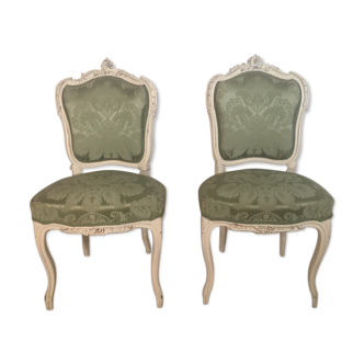 Two Louis XV style chairs, spine and green silk fabrics