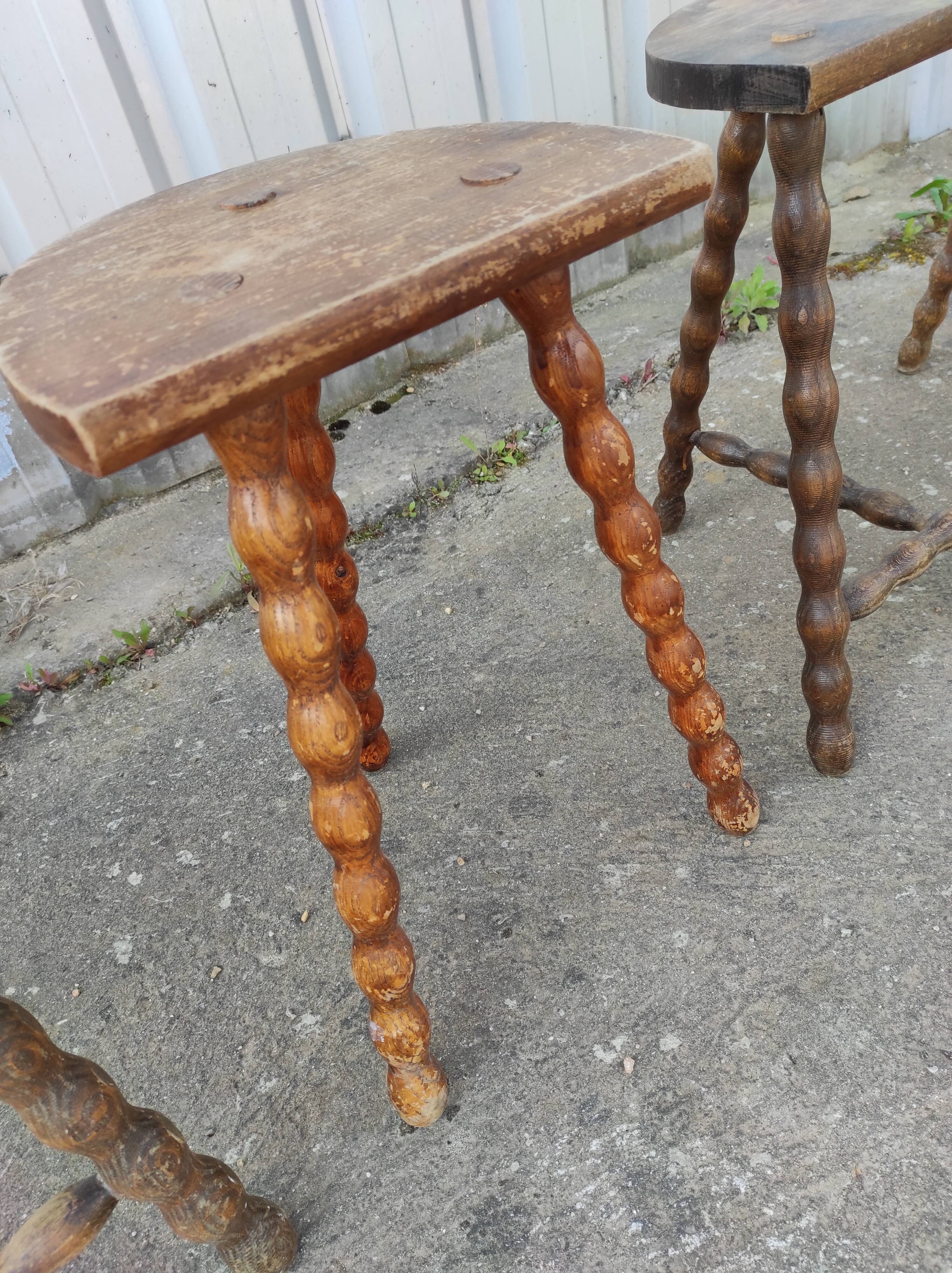 Lot 4 twisted wood tripod stools