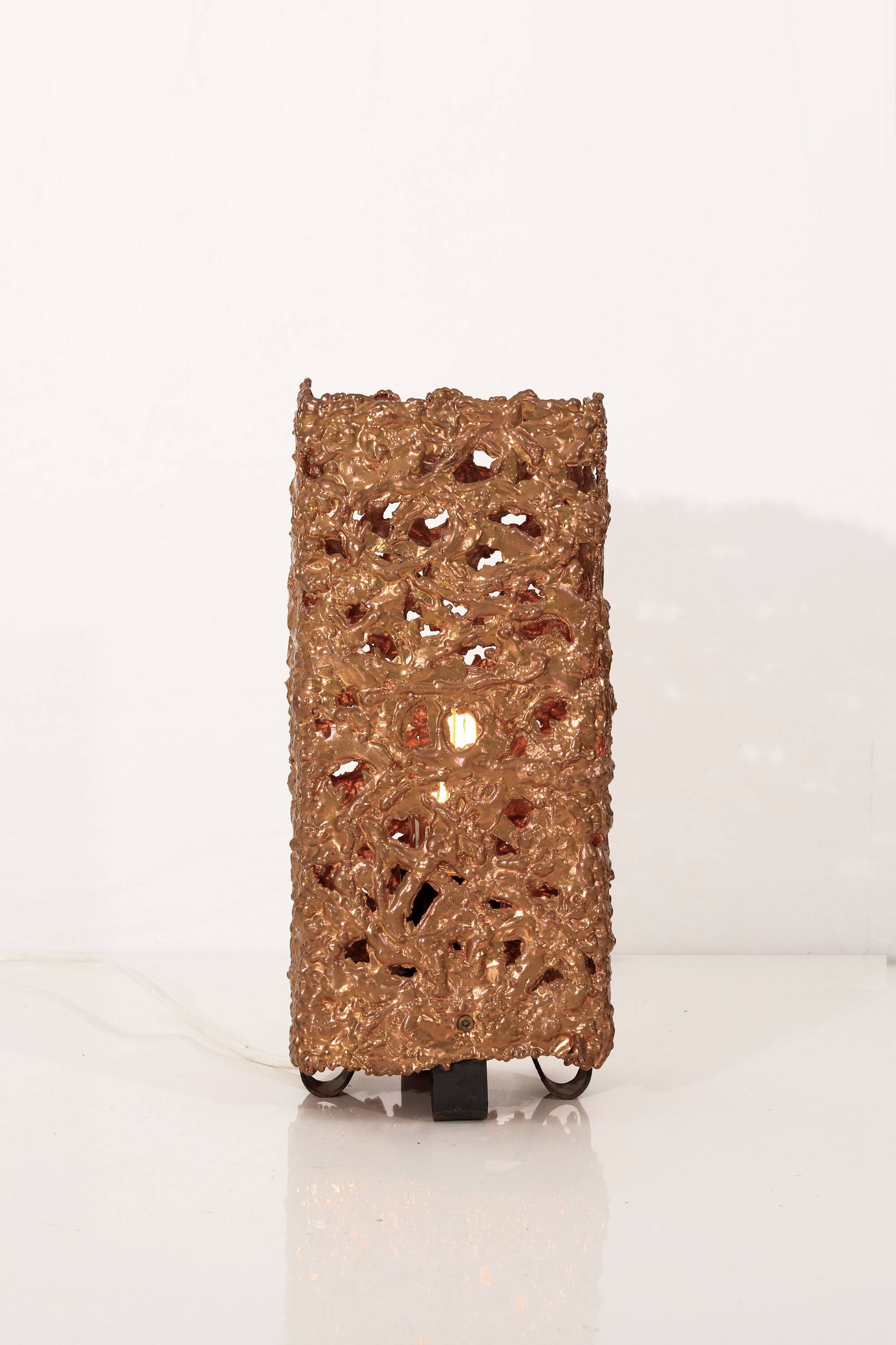 Set of 3 Finnish Aimo Tukiainen lamps in cast copper, 1960s."