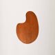 Biomorphic teak and brass side table from the 1950s–1960s