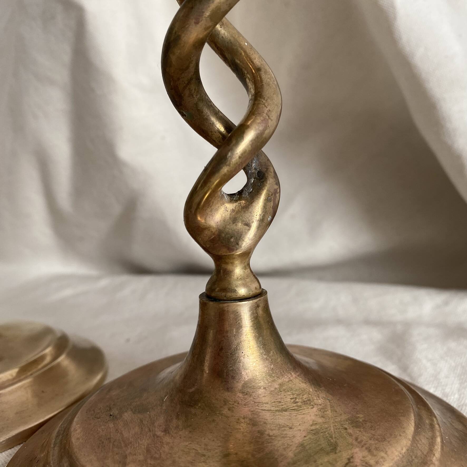 Pair of twisted brass candlesticks