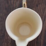 Ecru ceramic milk jug with gold decoration from Sarreguemines.