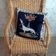 Fauteuil vintage en rotin tressé.