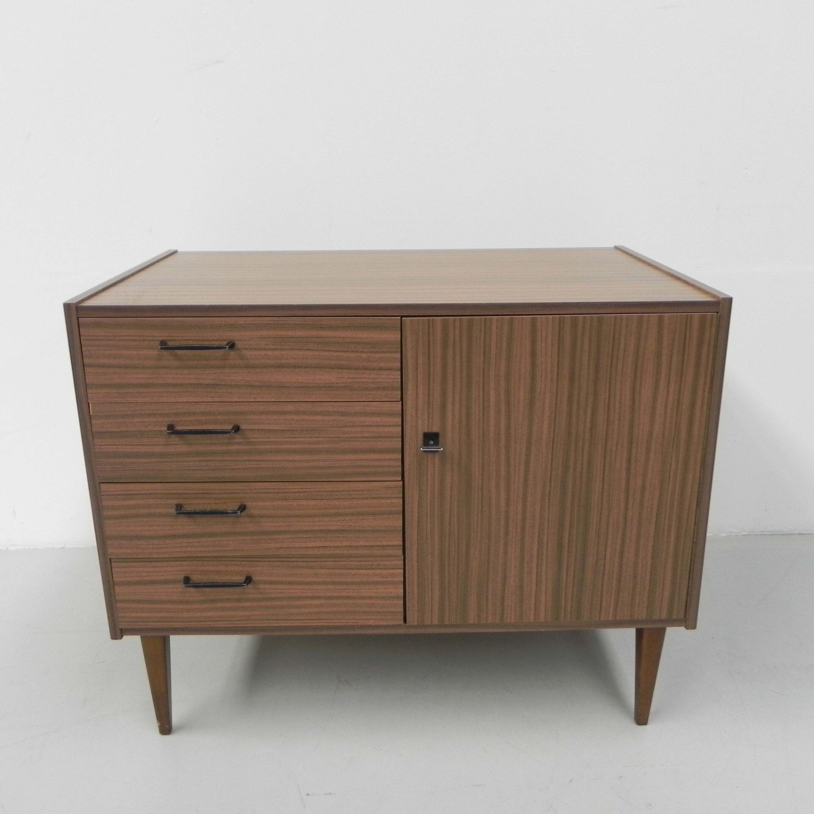 Vintage chest of drawers on tapered legs