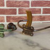 2 mismatched steel and wood coat hooks