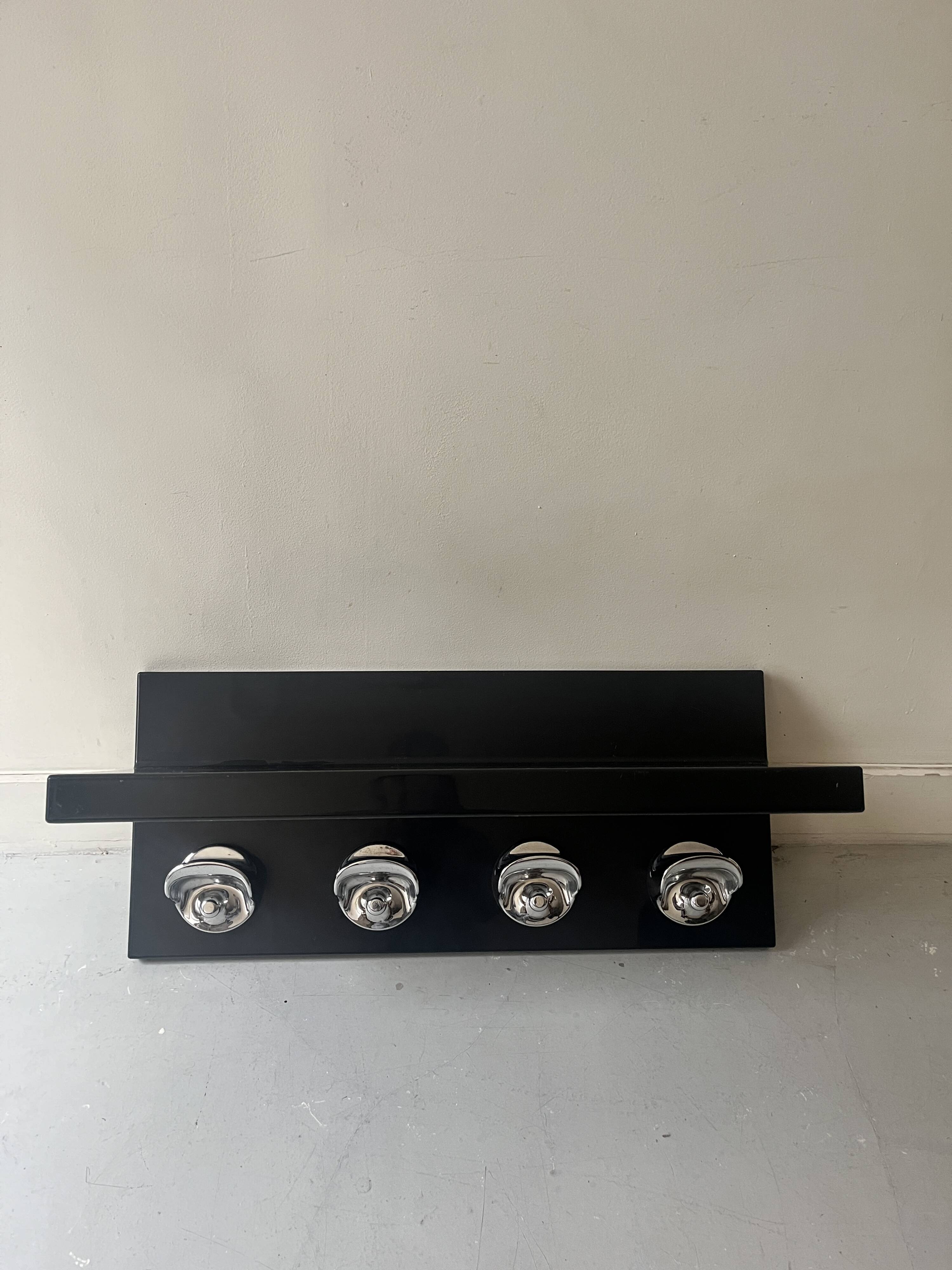 Large black magazine rack by Giotto Stoppino for Kartell, Italy 1970.