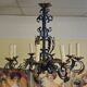 Black and gold patinated wrought iron chandelier – 10 lights – Louis XIV style