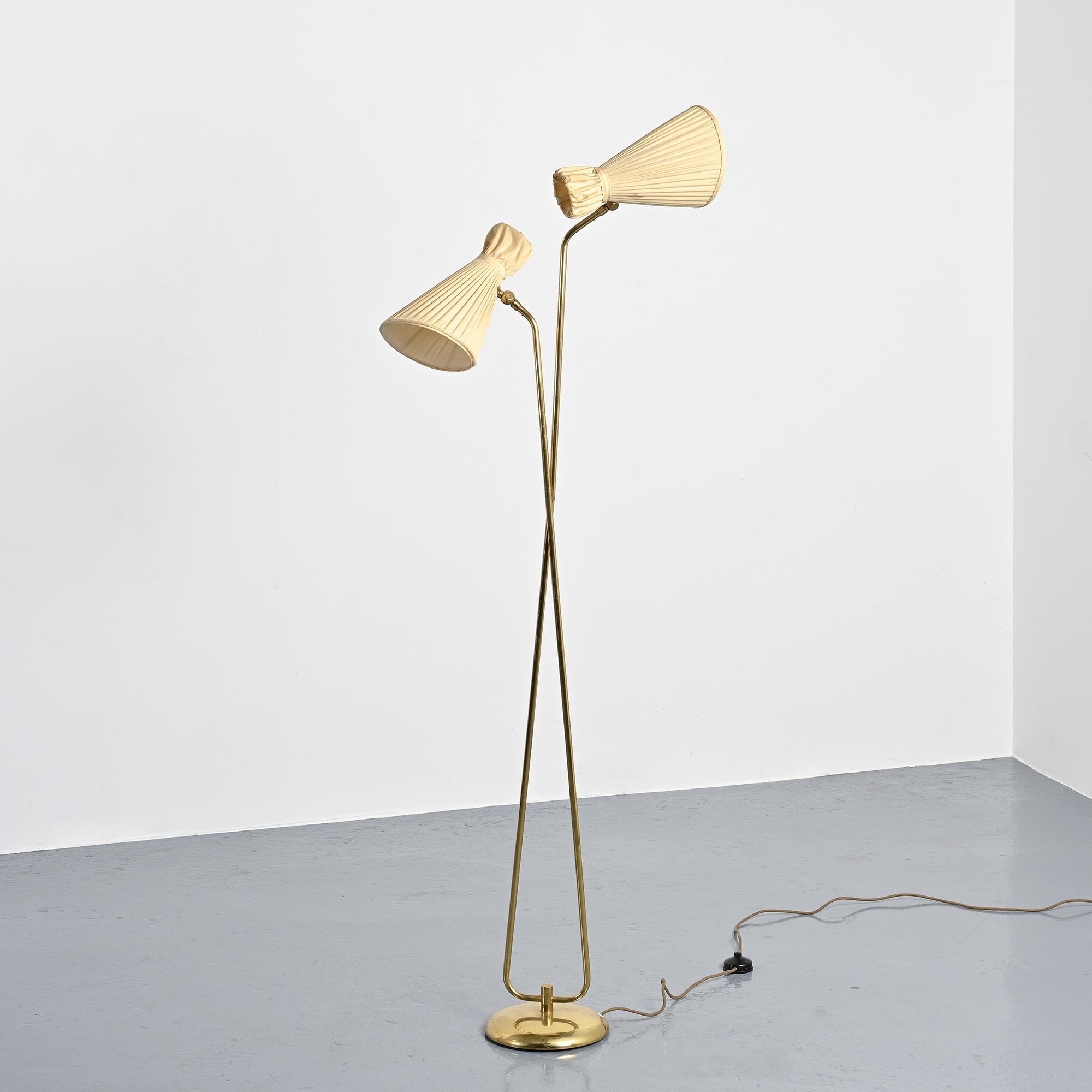 Two-arm adjustable floor lamp by BAG Turgi, Switzerland, 1950s.