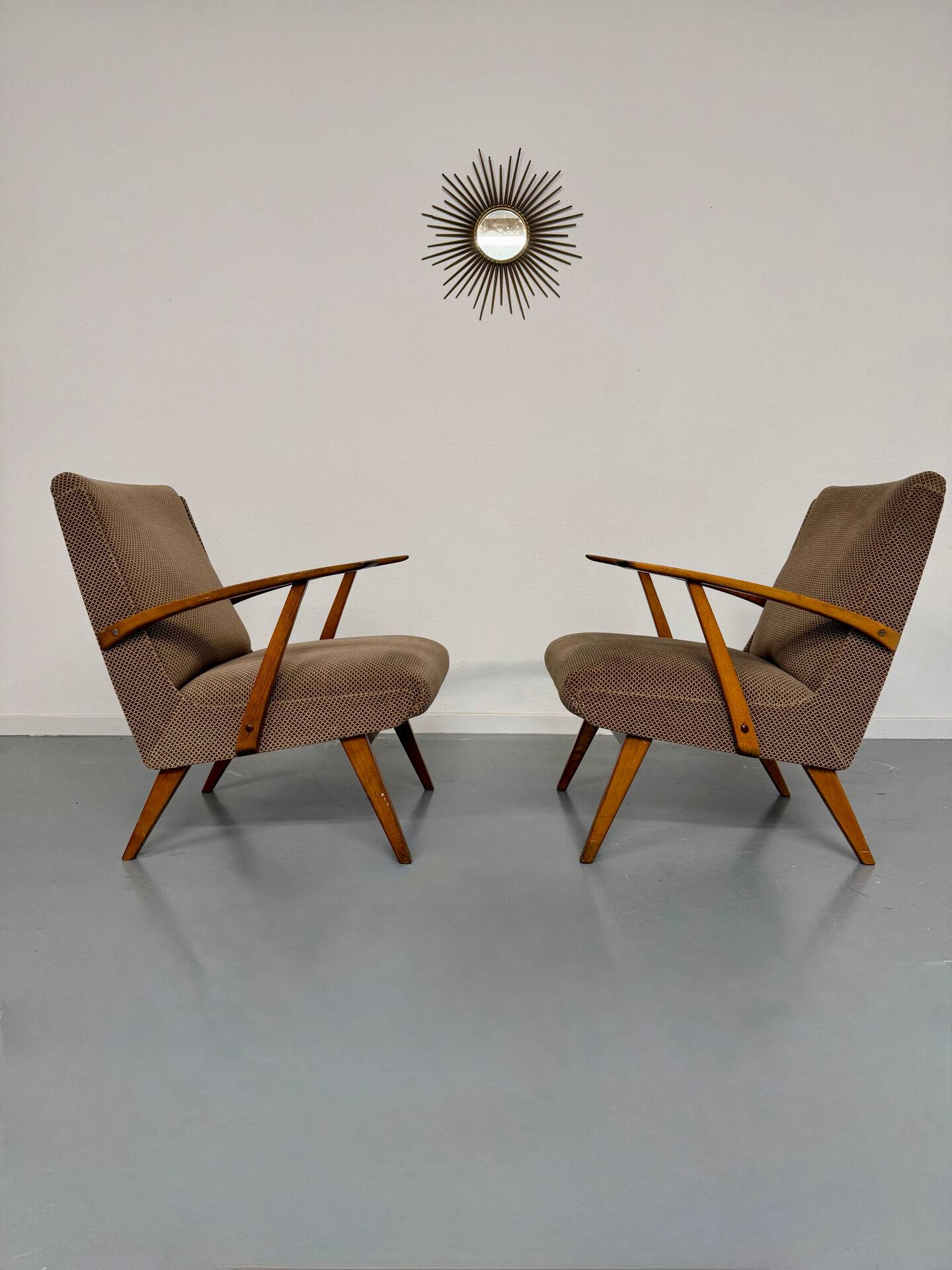 Set of 2 vintage wooden and fabric armchairs designed in the 1960s.