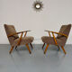 Set of 2 vintage wooden and fabric armchairs designed in the 1960s.