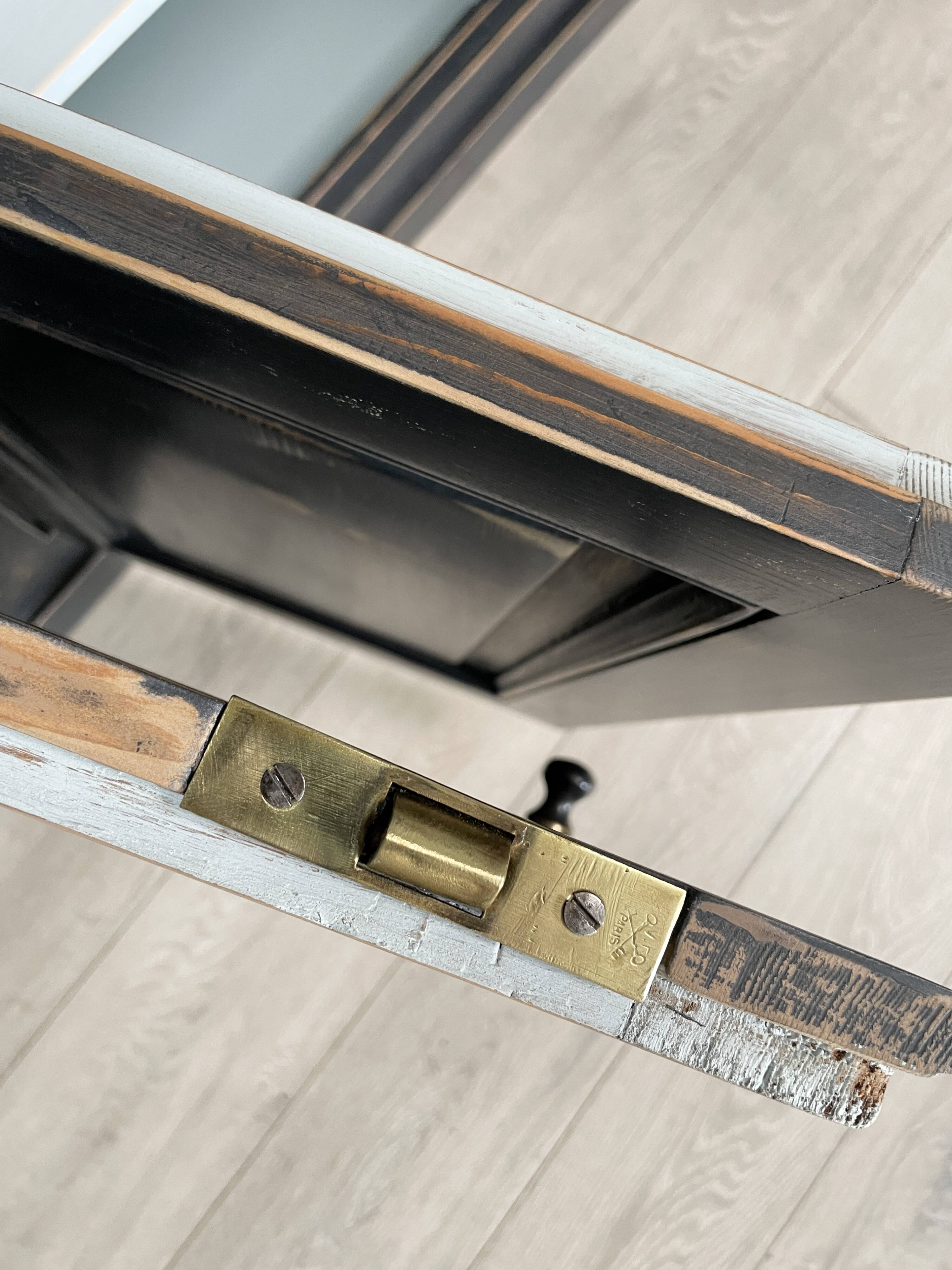 Display cabinet in patinated wood